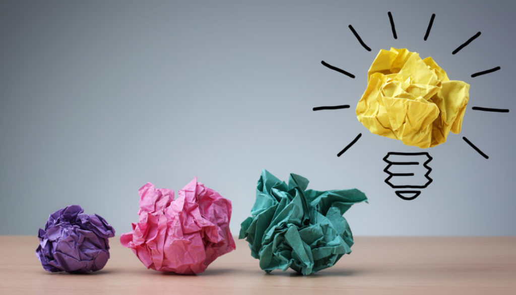 Inspiration concept crumpled paper light bulb metaphor for good idea